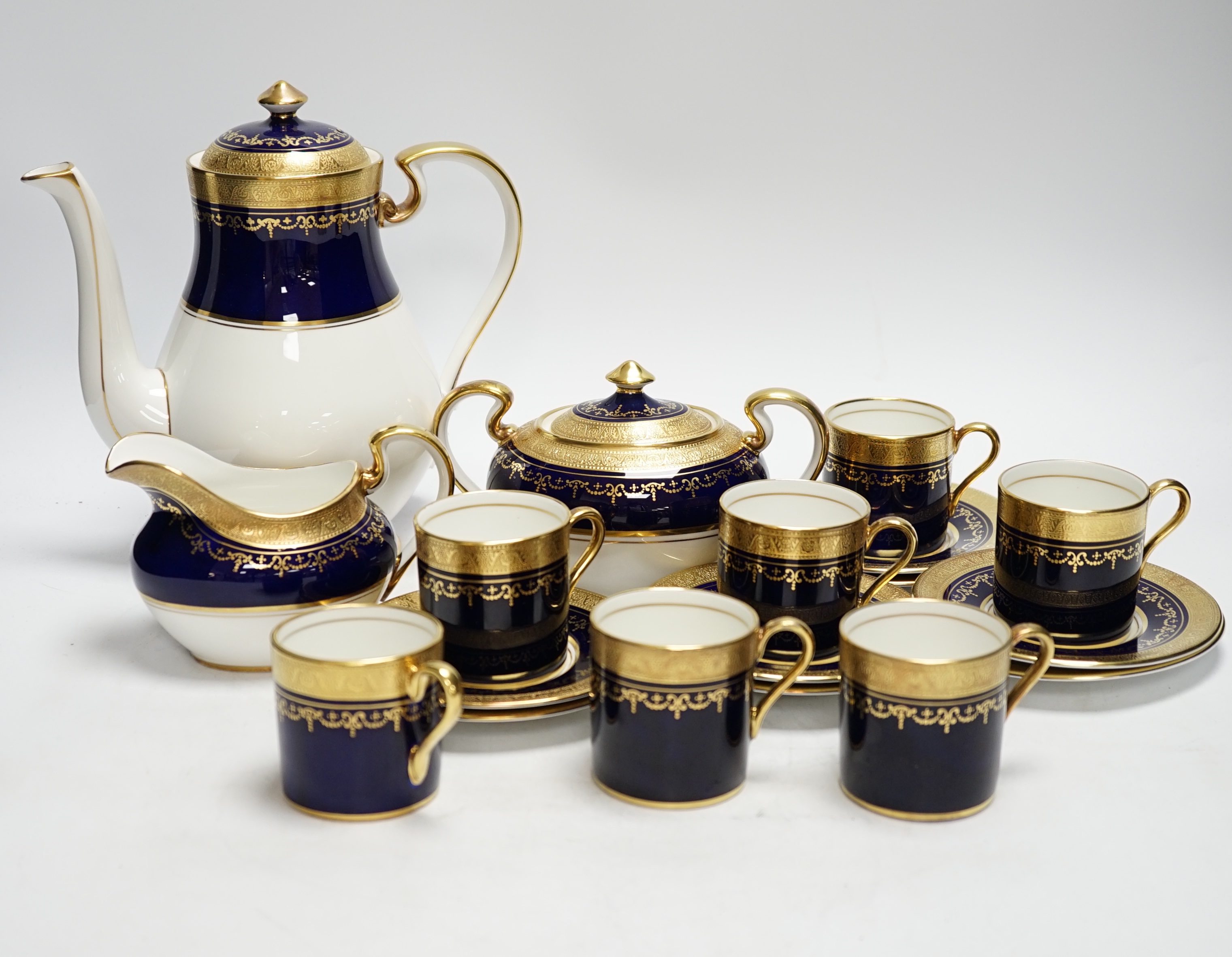 An Aynsley 'Georgian Cobalt' eight place setting coffee service (one coffee cup missing)